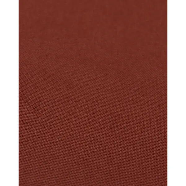 Close up of dark chocolate pure cotton canvas fabric showing textured Panama weave