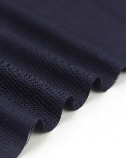 Ripple view of navy pure cotton canvas fabric with Panama weave texture