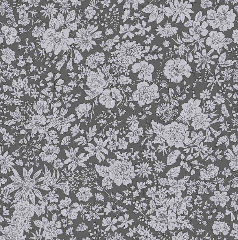 Grey floral pattern on a light black quilting cotton