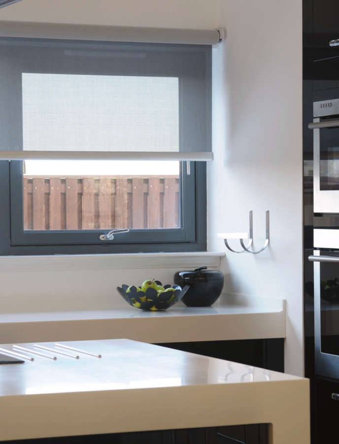 Roller blind fitted in a contemporary kitchen