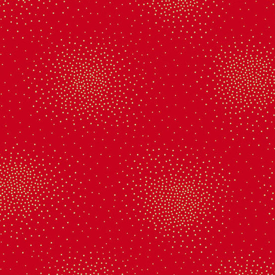 A red cotton fabric featuring small light gold dots arranged in several circular halftone clusters across the surface.