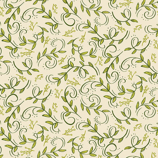 Swirling green foliage in green on a cream quilting cotton