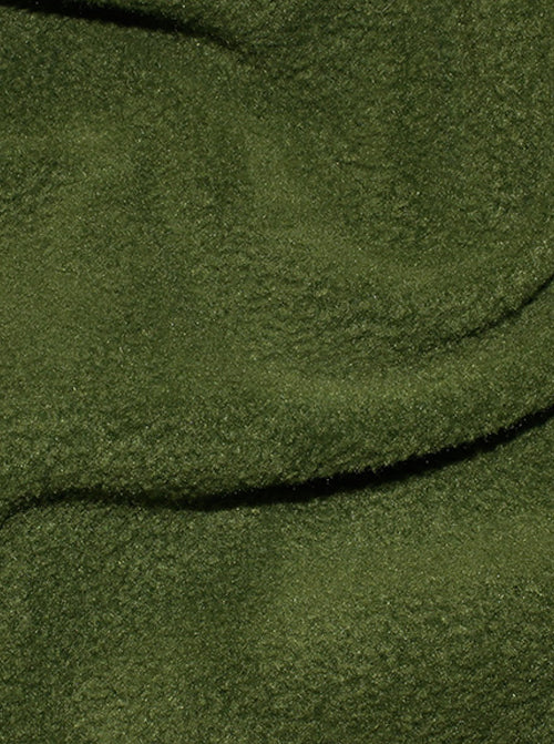 Close up of forest green anti-pil polar fleece fabric with fluffy brushed finish