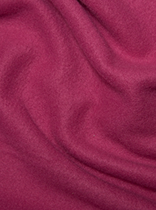 Close up of deep cerise pink anti-pil polar fleece fabric with plush soft texture