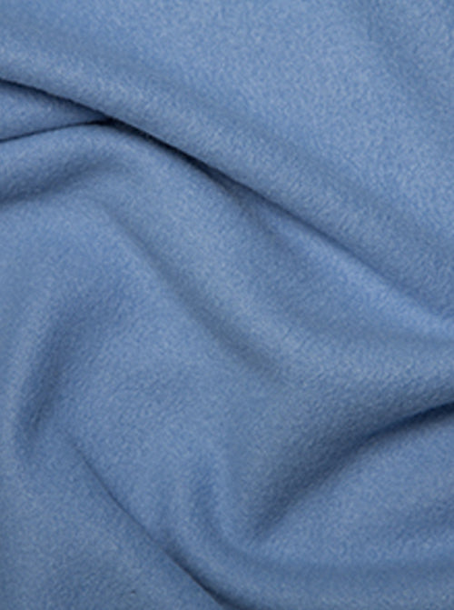 Close up of hyacinth blue anti-pil polar fleece fabric showing plush brushed fibres