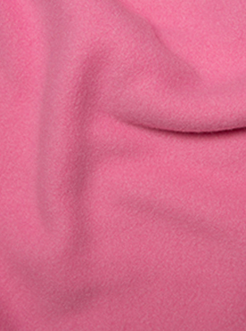 Close up of candy pink anti-pil polar fleece fabric with soft fluffy pile