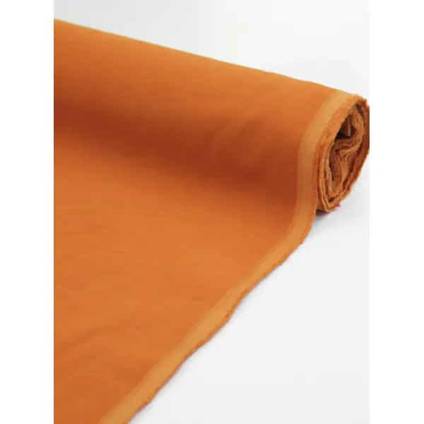 Roll of turmeric pure cotton babycord fabric with soft fine corduroy ribs
