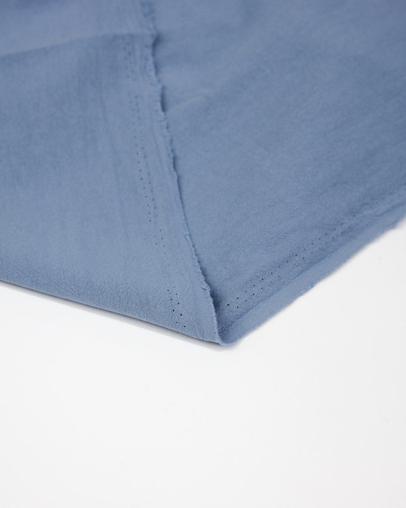 Crushed washed cotton fabric in periwinkle blue