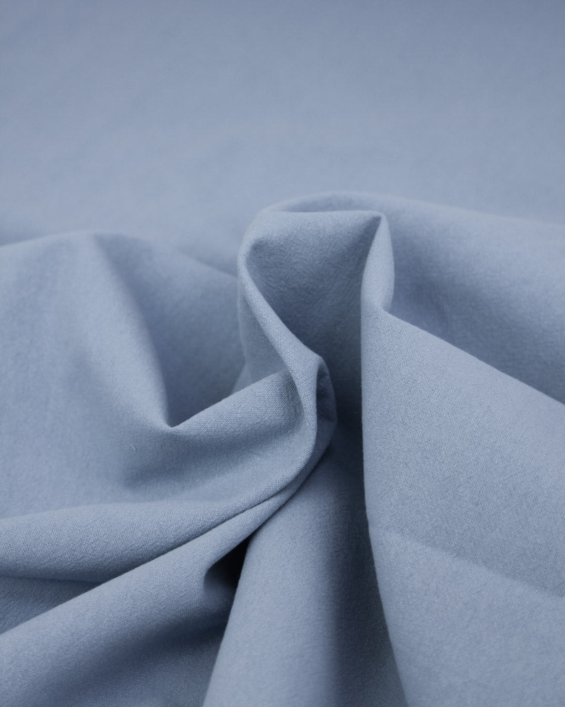 Crushed washed cotton fabric in periwinkle blue