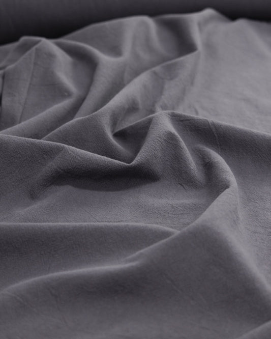 Crushed washed cotton fabric in dark grey
