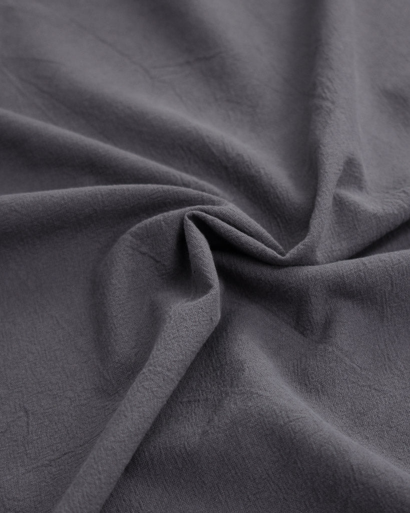 Crushed washed cotton fabric in dark grey