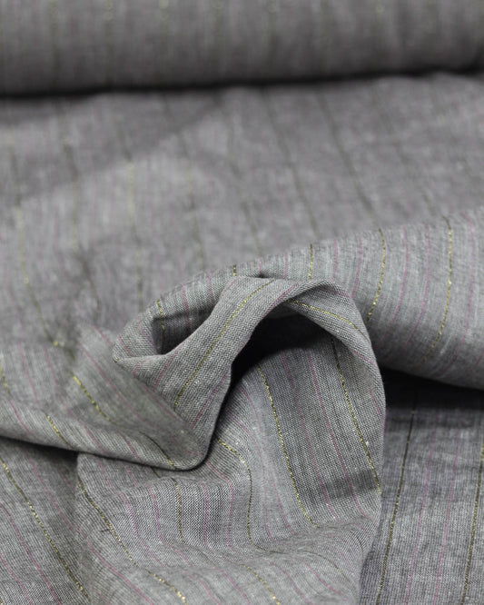 Close-up of grey linen and viscose blend fabric with a subtle stripe pattern