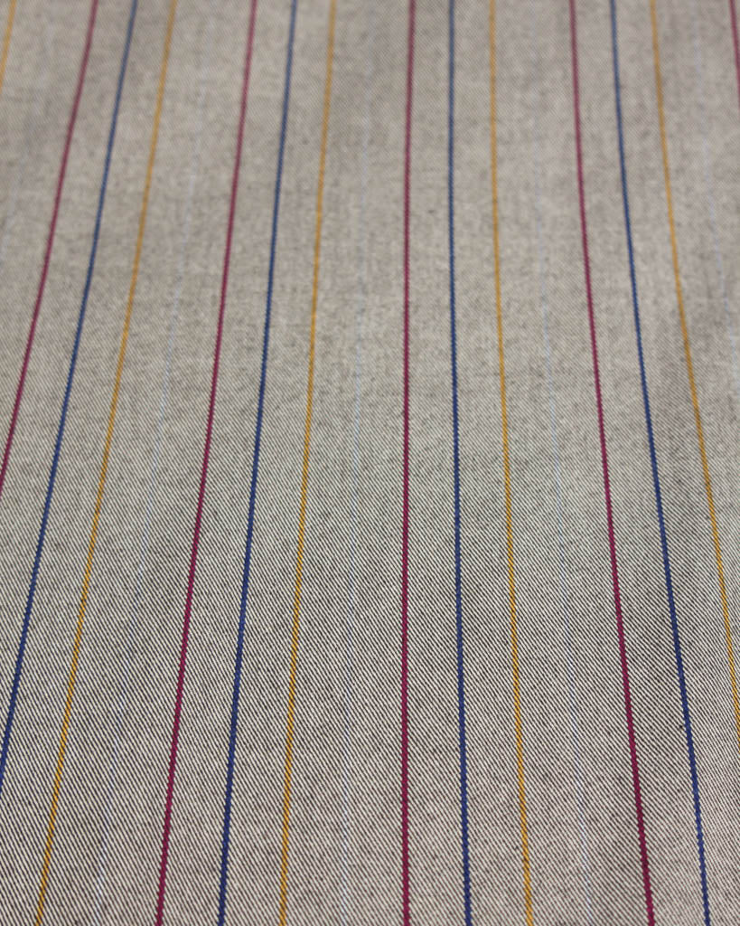 Poly viscose fabric with multicolored vertical stripes on a neutral background