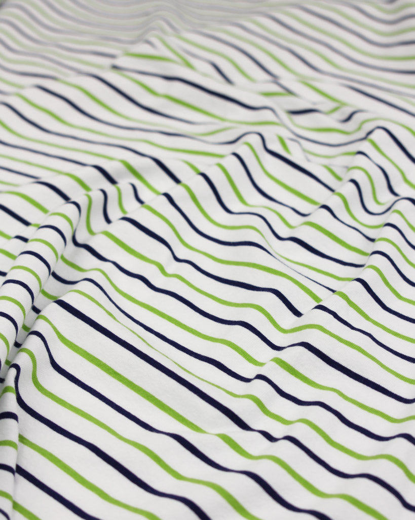 cotton jersey fabric with green and navy stripe lines on a white background