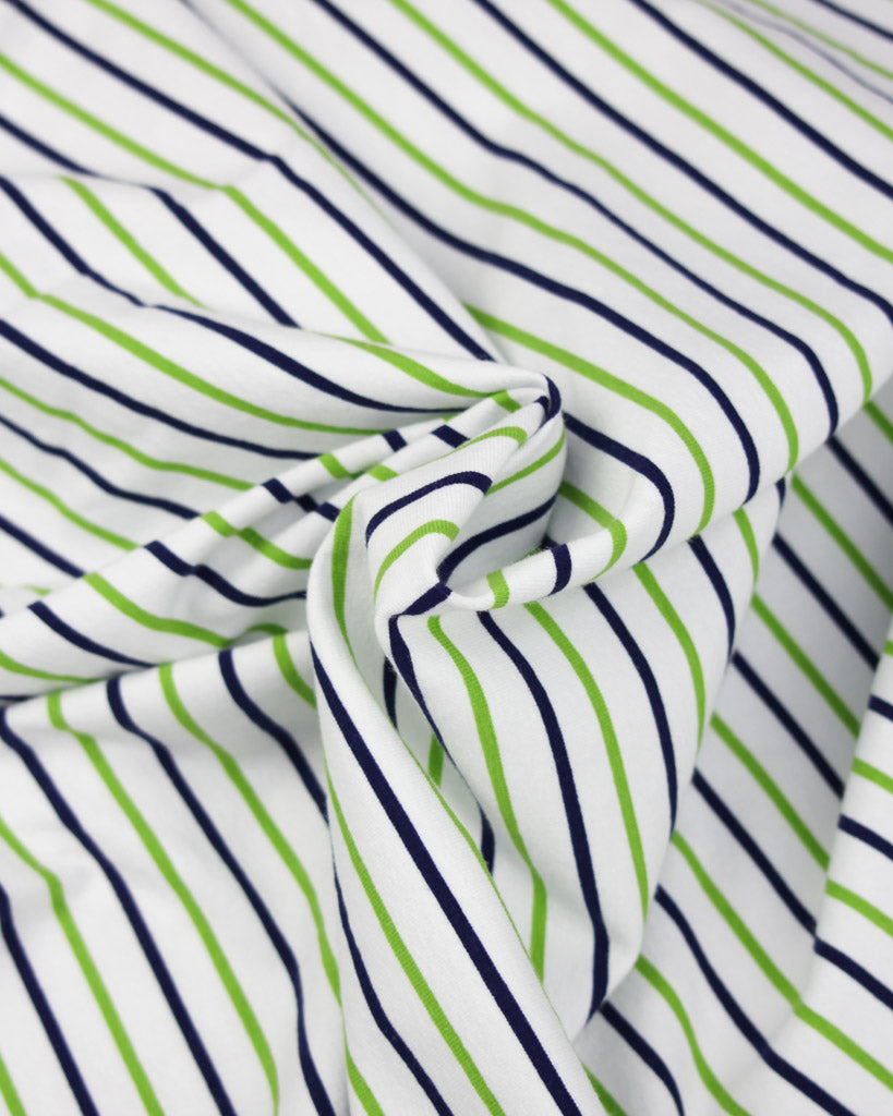 Striped cotton jersey fabric with green and navy lines on a white background