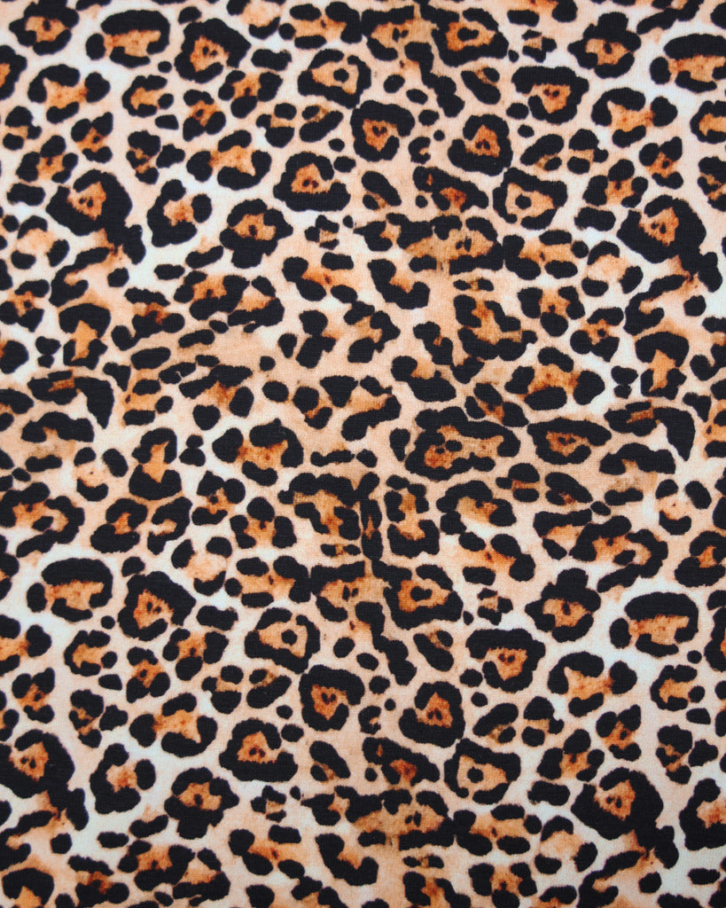Leopard print pattern on a cotton jersey fabric background