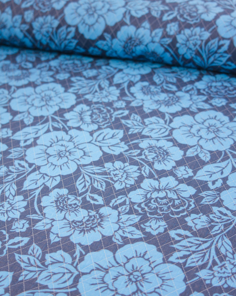 Blue floral quilted fabric 