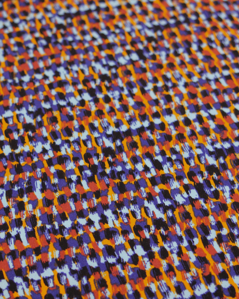 Multicolored geometric dot pattern viscose twill fabric 