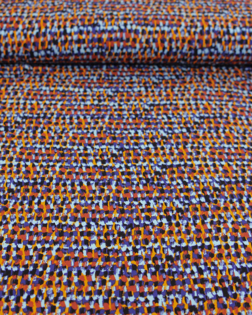 Viscose twill fabric with a multicolored pattern of dots