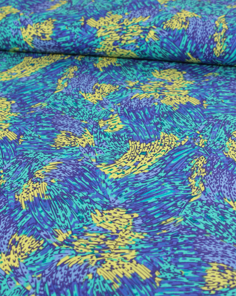 Blue and yellow abstract patterned viscose fabric
