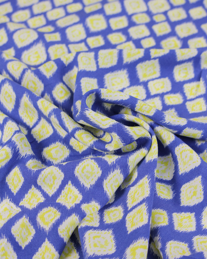 Viscose lawn fabric with blue and yellow geometric pattern