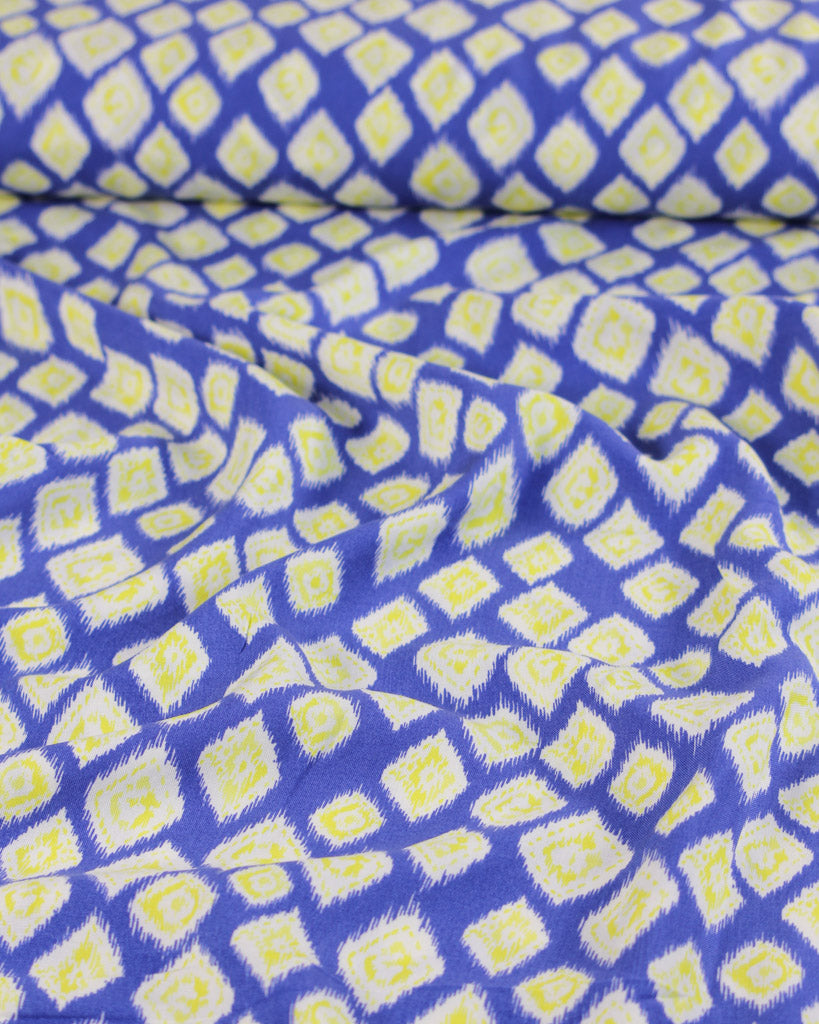 Viscose lawn fabric with blue and yellow geometric pattern