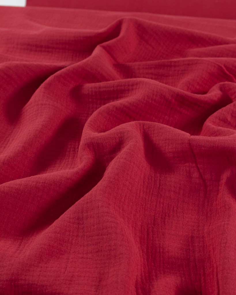 Close-up of red cotton double gauze fabric