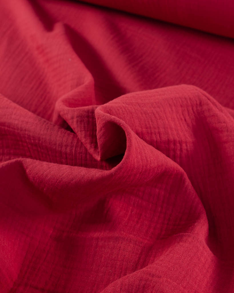 Close-up of red cotton double gauze fabric 