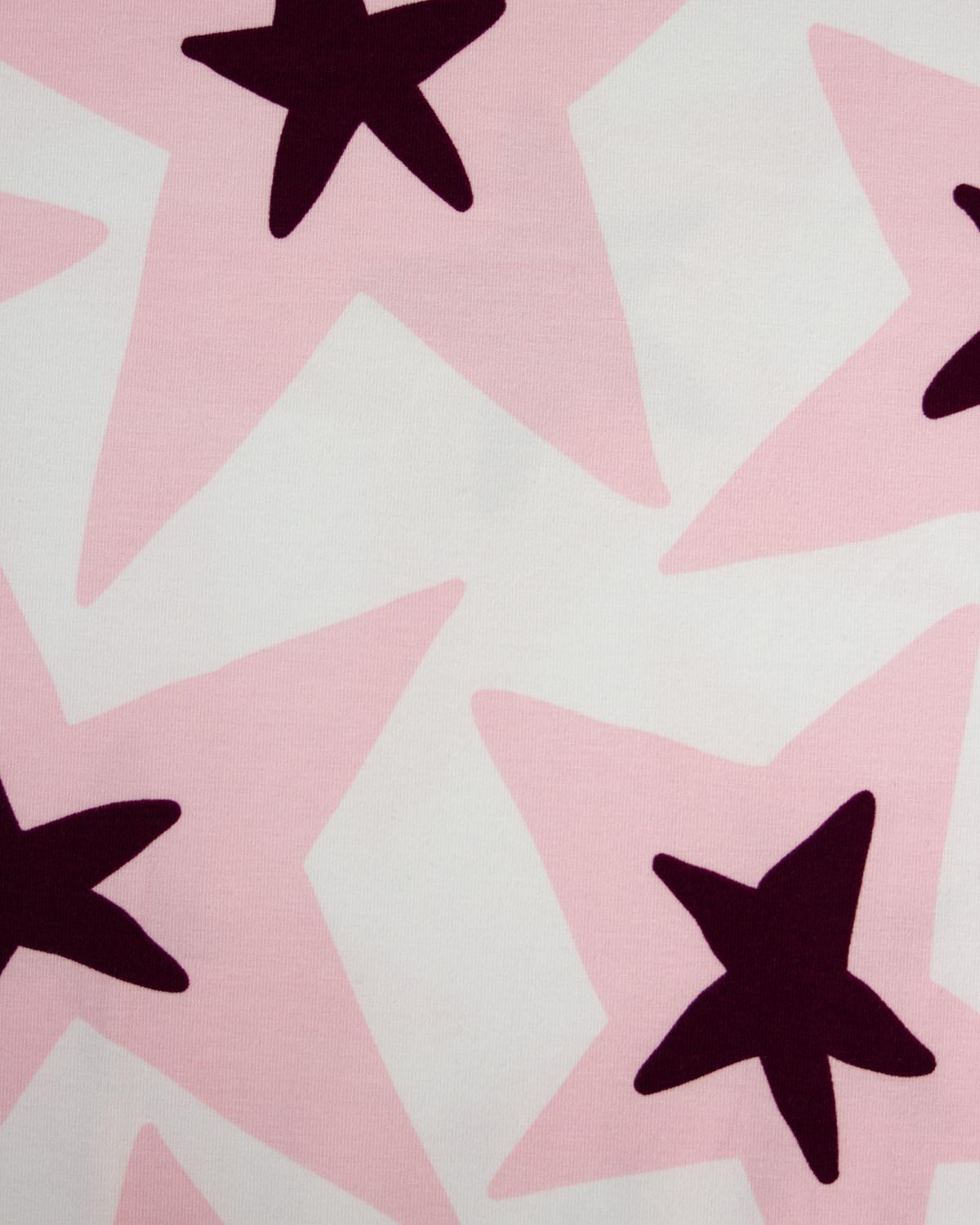 A close-up of a jersey fabric pattern featuring large light pink stars with dark plum-purple five-pointed star overlays on a white background.