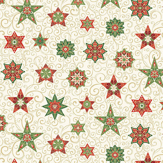 Pattern of red and green stars on a cream quilting cotton