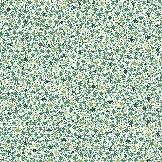 Pattern of green stars on a cream quilting cotton