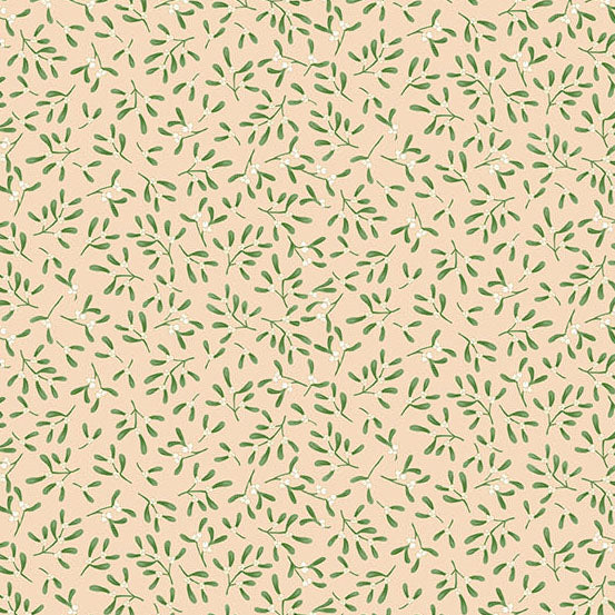 Pattern of green leaves on a cream quilting cotton