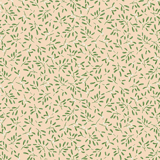 Pattern of green leaves on a cream quilting cotton