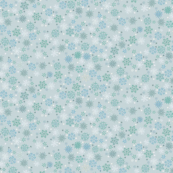 Pattern of snowflakes on a light blue quilting cotton