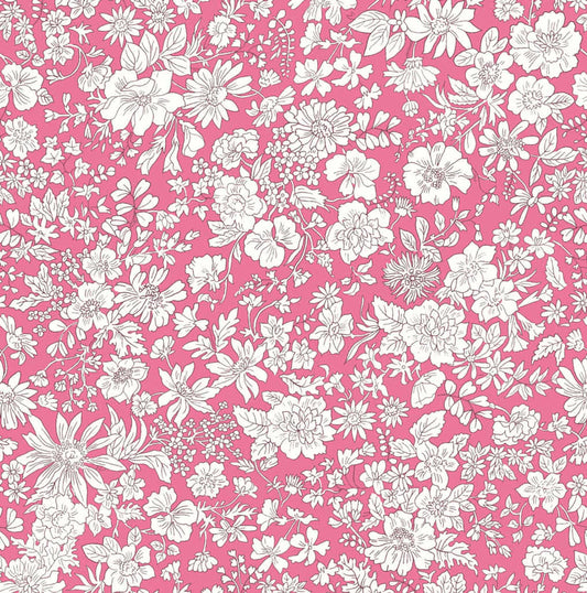 Ivory floral pattern on a pink quilting cotton