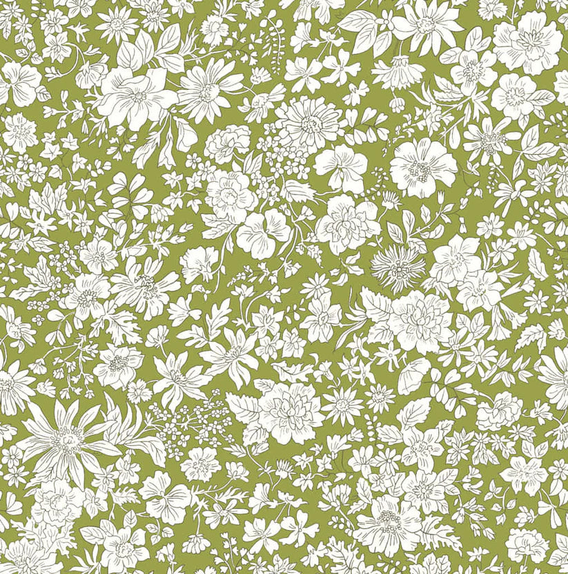 Ivory floral pattern on a bright green quilting cotton