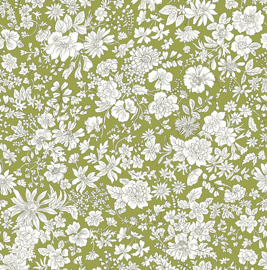 Ivory floral pattern on a bright green quilting cotton