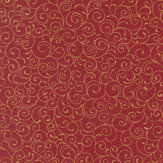 Red cotton fabric with gold swirling pattern