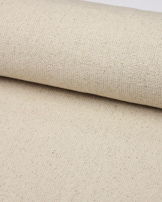 Woven cotton upholstery fabric in a natural beige