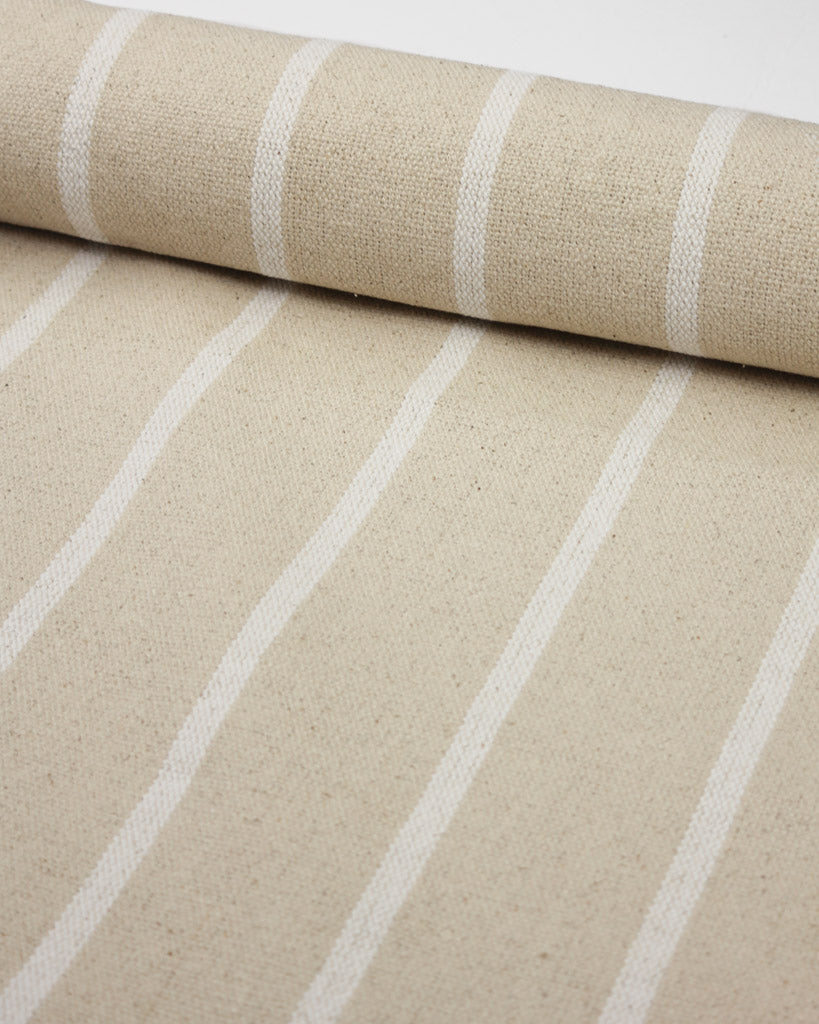 Cream upholstery fabric with white vertical stripes
