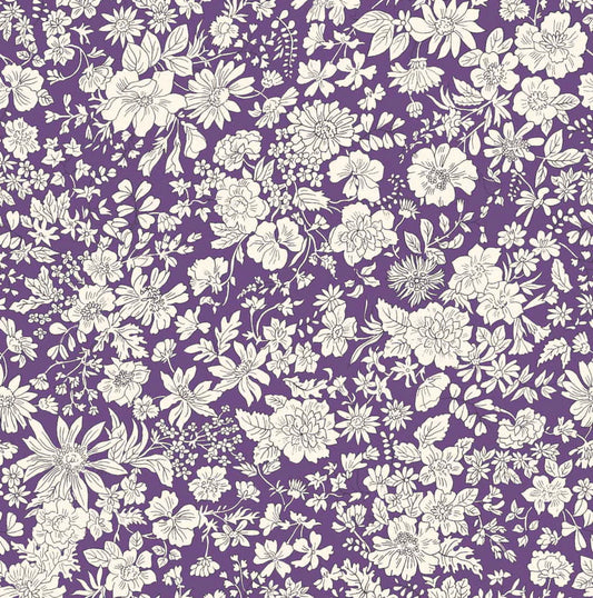 Ivory floral pattern on a purple quilting cotton