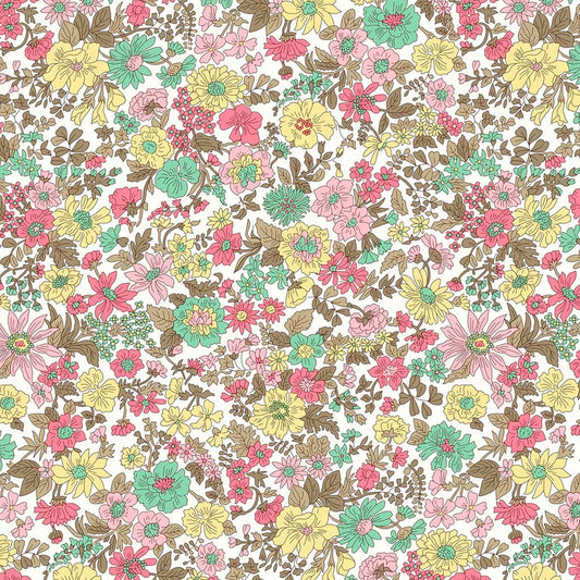 Quilting weight cotton featuring a floral design in pinks, greens, and yellows with brown foliage