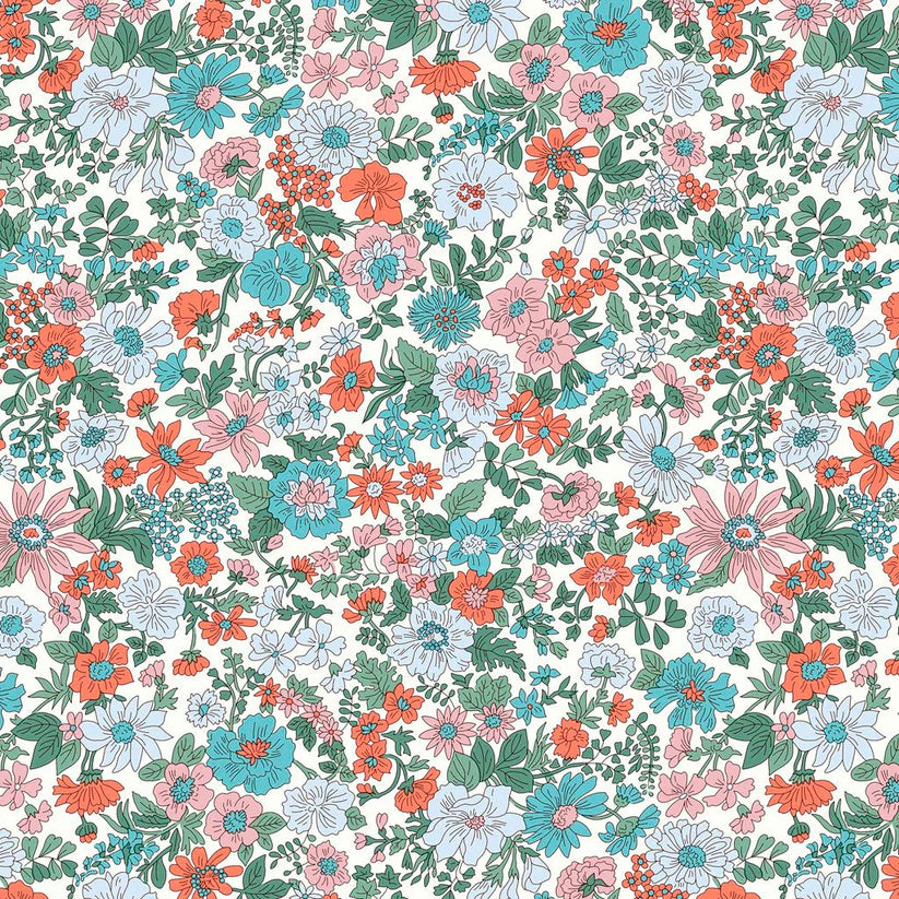 Pattern of pink, blue and red flowers with green foliage on a white quilting cotton backgroiund 