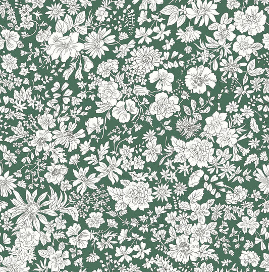 Ivory floral pattern on a deep green quilting cotton
