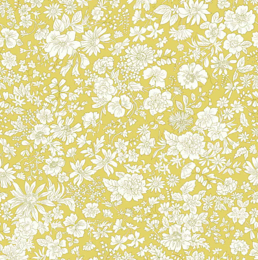 Ivory floral pattern on a lime quilting cotton