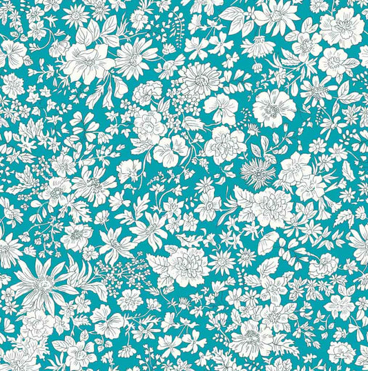 Ivory floral pattern on a turquoise quilting cotton