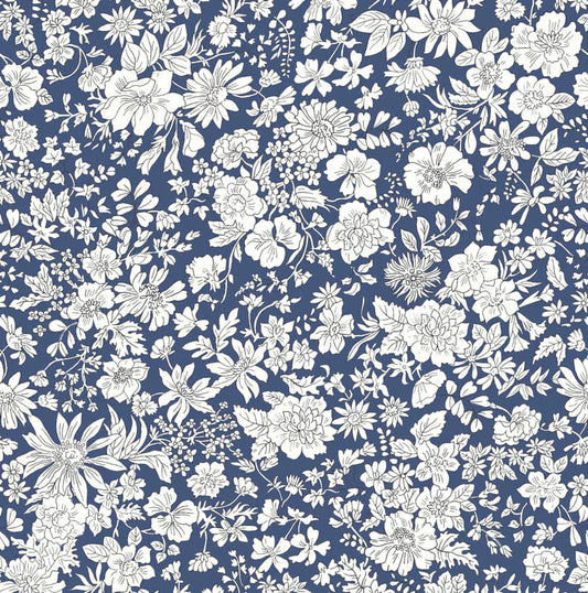 Ivory floral pattern on a navy blue quilting cotton