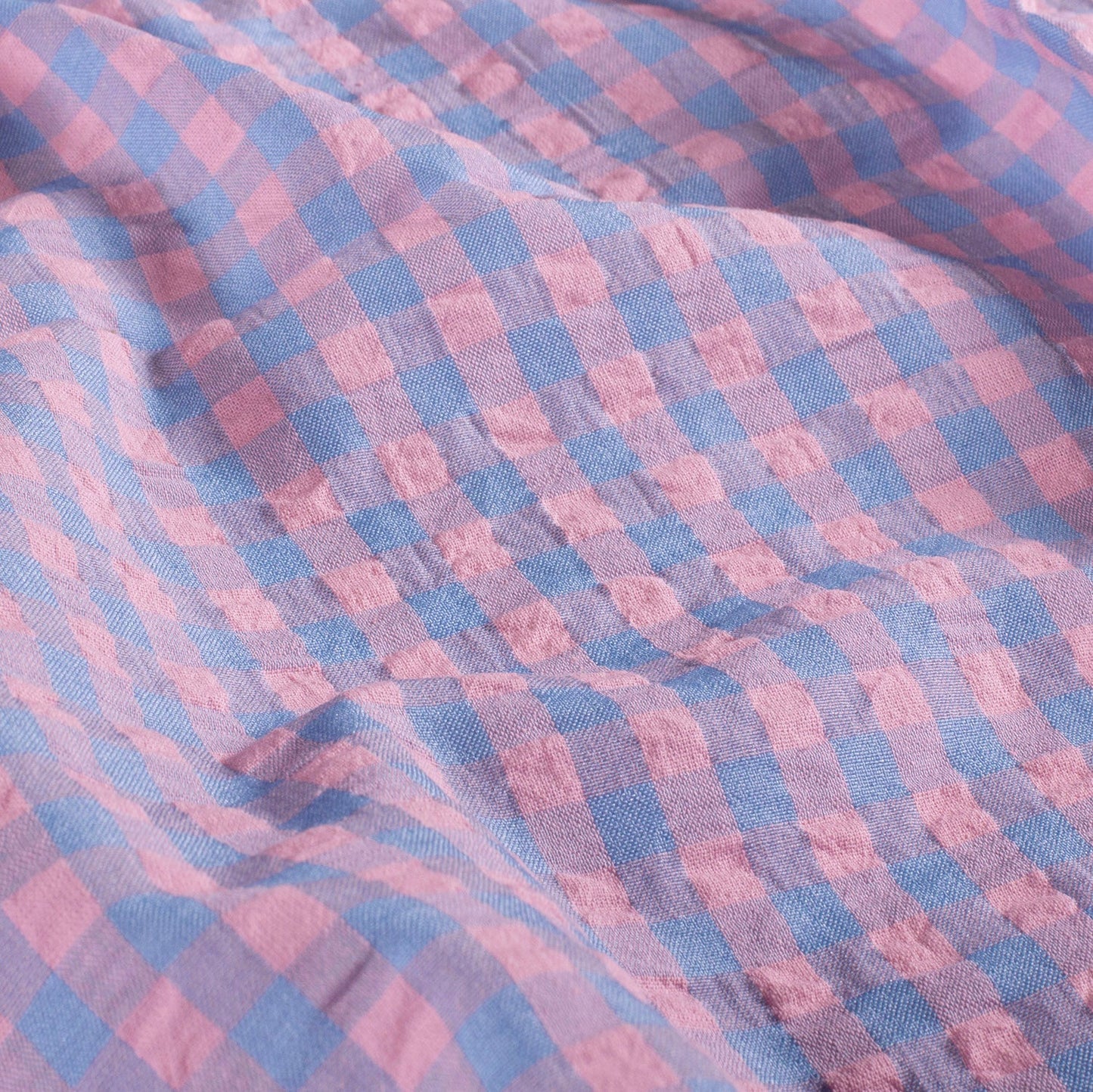 Close-up of pink and blue checkered fabric
