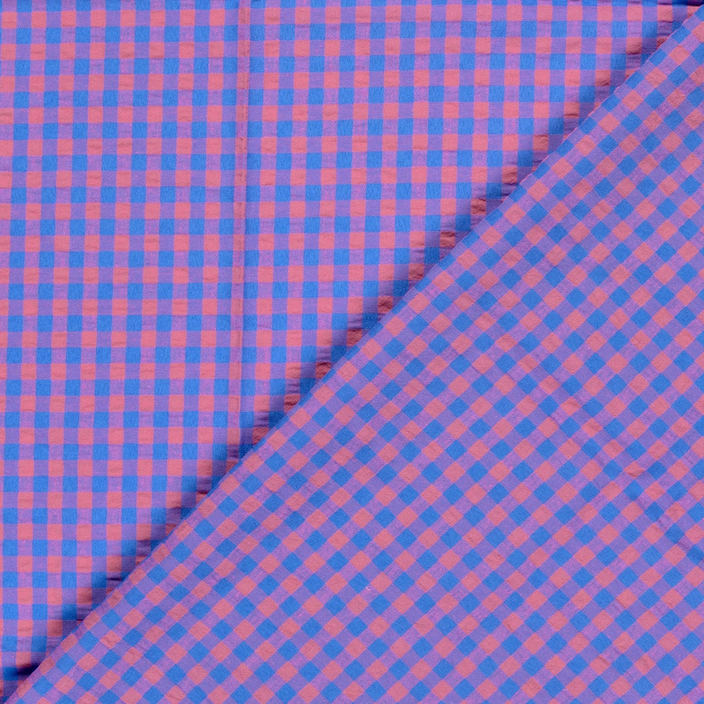 Checkered fabric with blue and pink pattern