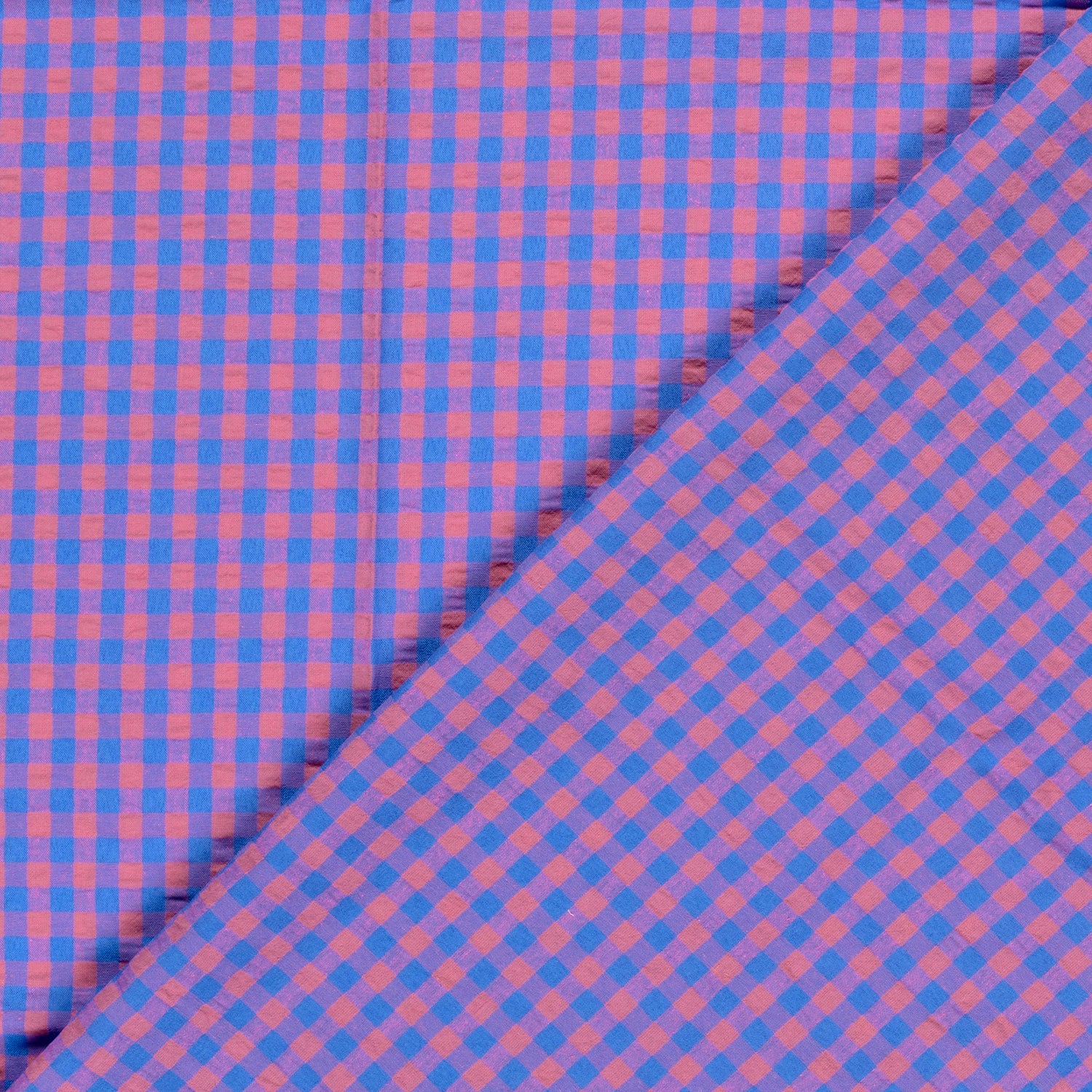 Checkered fabric with blue and pink pattern
